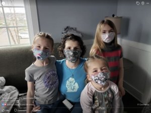 The Mervaus kids wearing face masks during COVID 19 stay at home order