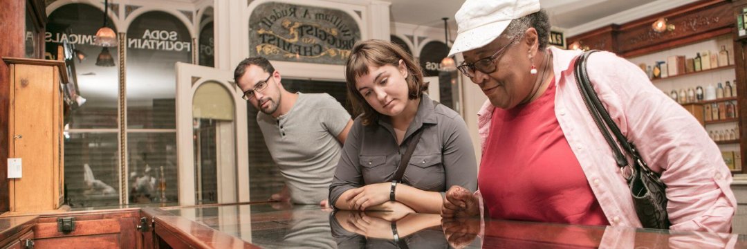 Streets of Old Grand Rapids exhibit Visitors explore the pharmacy in the Streets of Old Grand Rapids exhibit